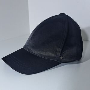 Steve Madden Shinny Black Classic Cap.